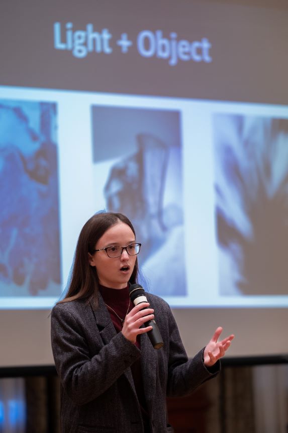 Chemistry student presents to class.