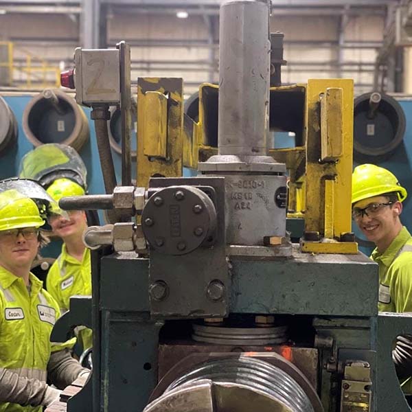 Carter Waye working with other Work+ students