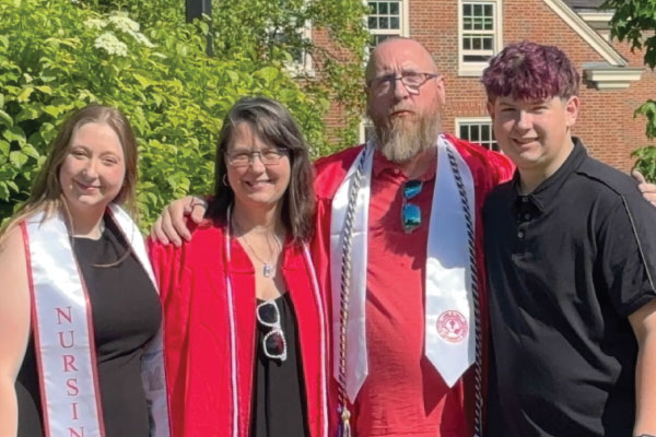 Ingle family at the 2025 commencement ceremony with Bailey, Jody, Mike, and Michael.