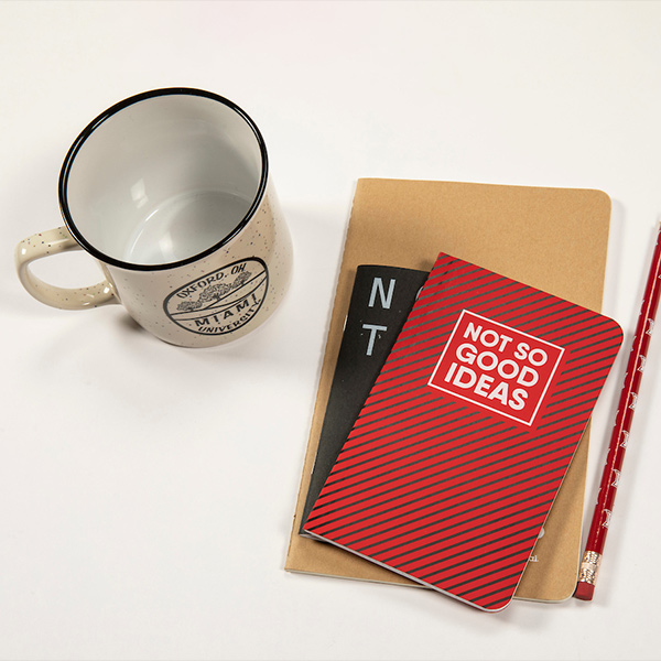 miami branded materials including a mug and notebooks