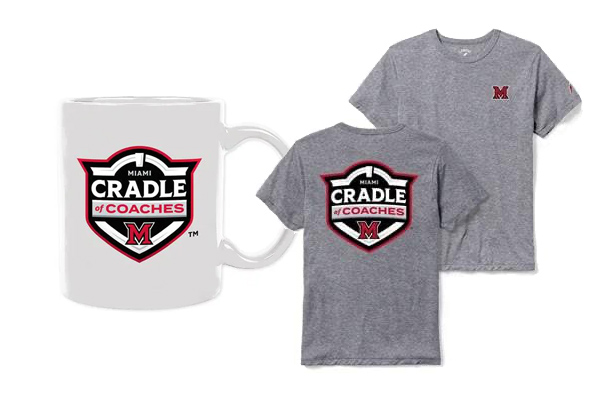 white mug with cradle of coaches logo. grey t-shirt with cradle of coaches logo