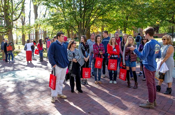 High school students taking a tour of Miami's Oxford campus