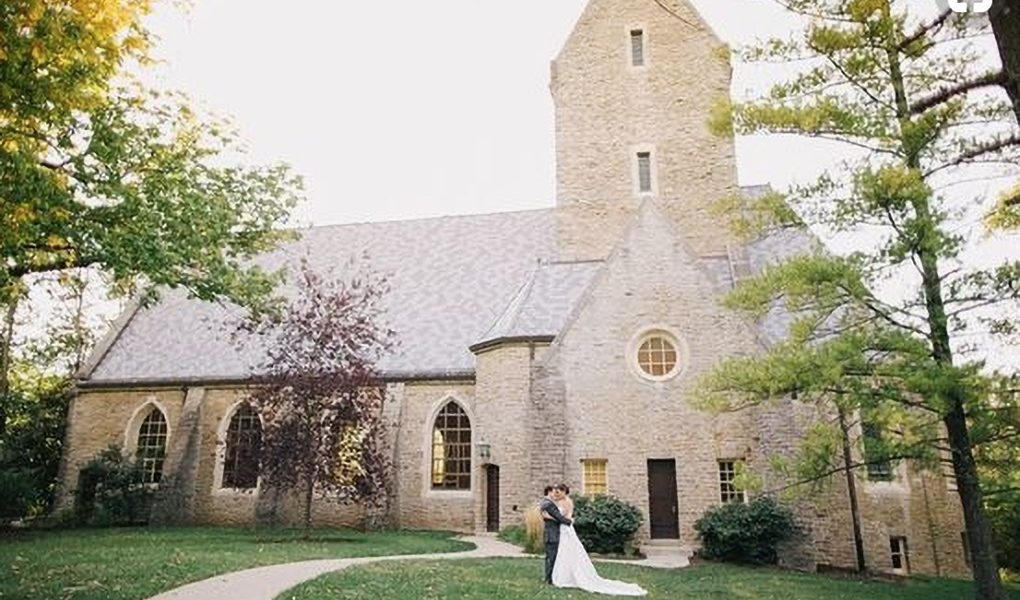 bride and groom outside kumler chapel